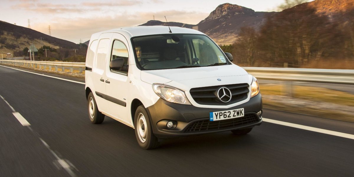 Fleet van driving down highway