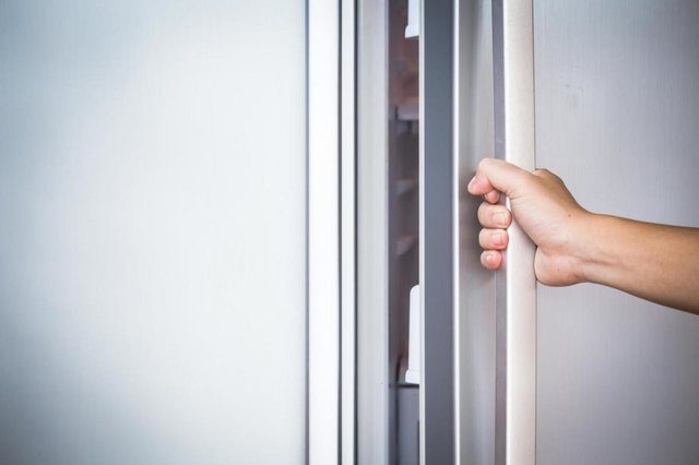 Fridge door being opened