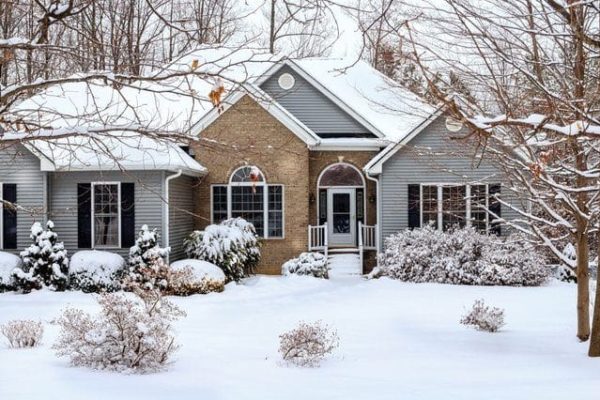 House at winter with snow on the ground