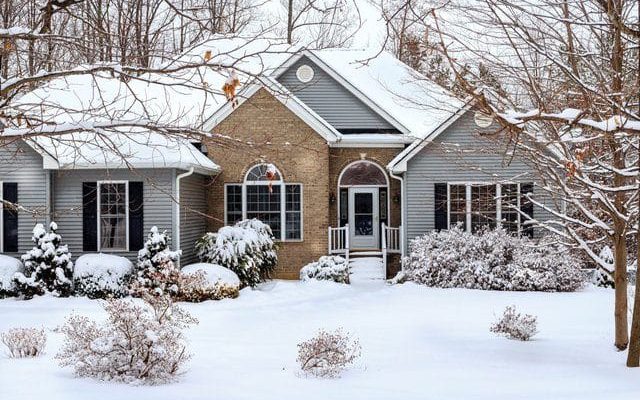 House at winter with snow on the ground